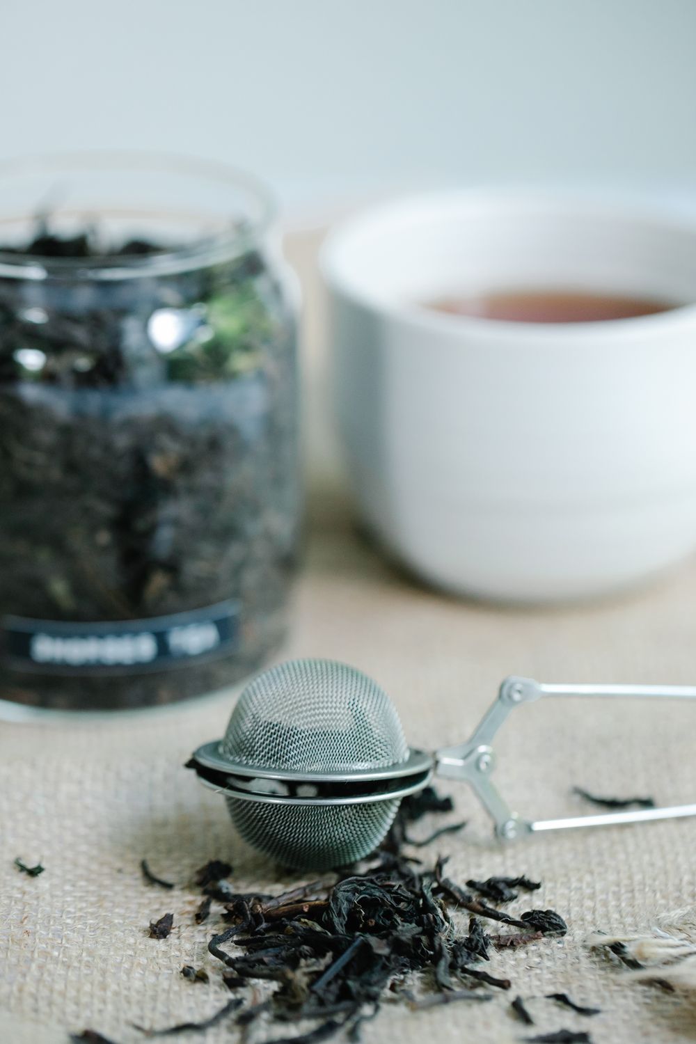 Loose tea and a tea strainer ready for brewing